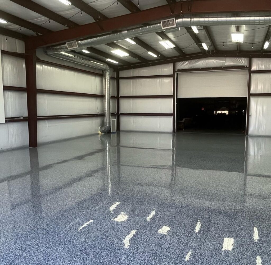 Steel-Frame Warehouse — Glossy Epoxy Floor